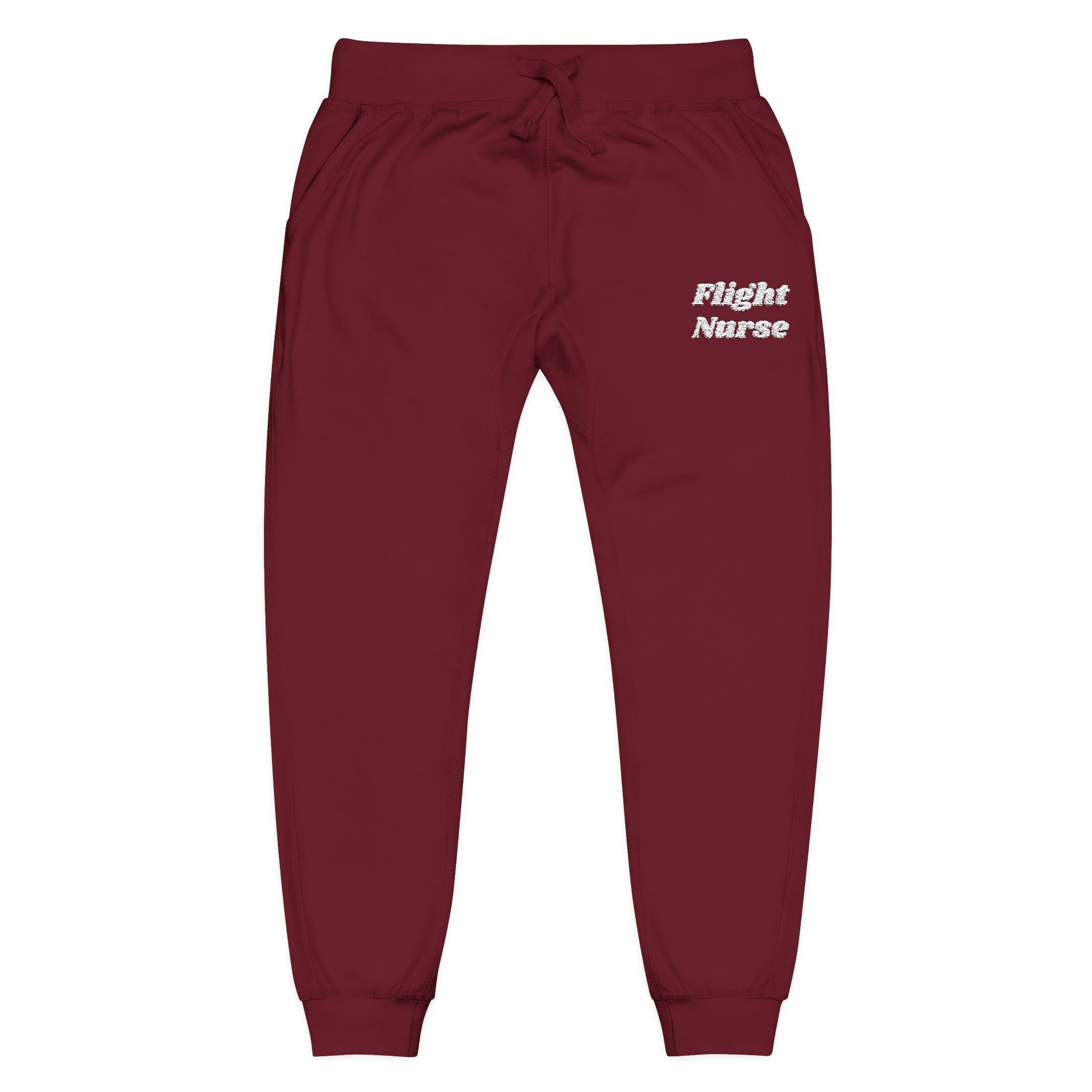 Maroon joggers with 'Flight Nurse' embroidered text on a white background