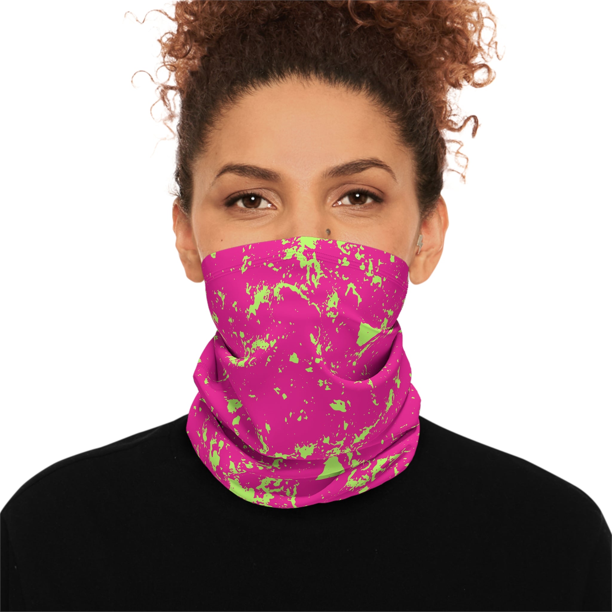 Person wearing a hot pink neck gaiter with neon green splatter pattern by Rotor Wash & Wear