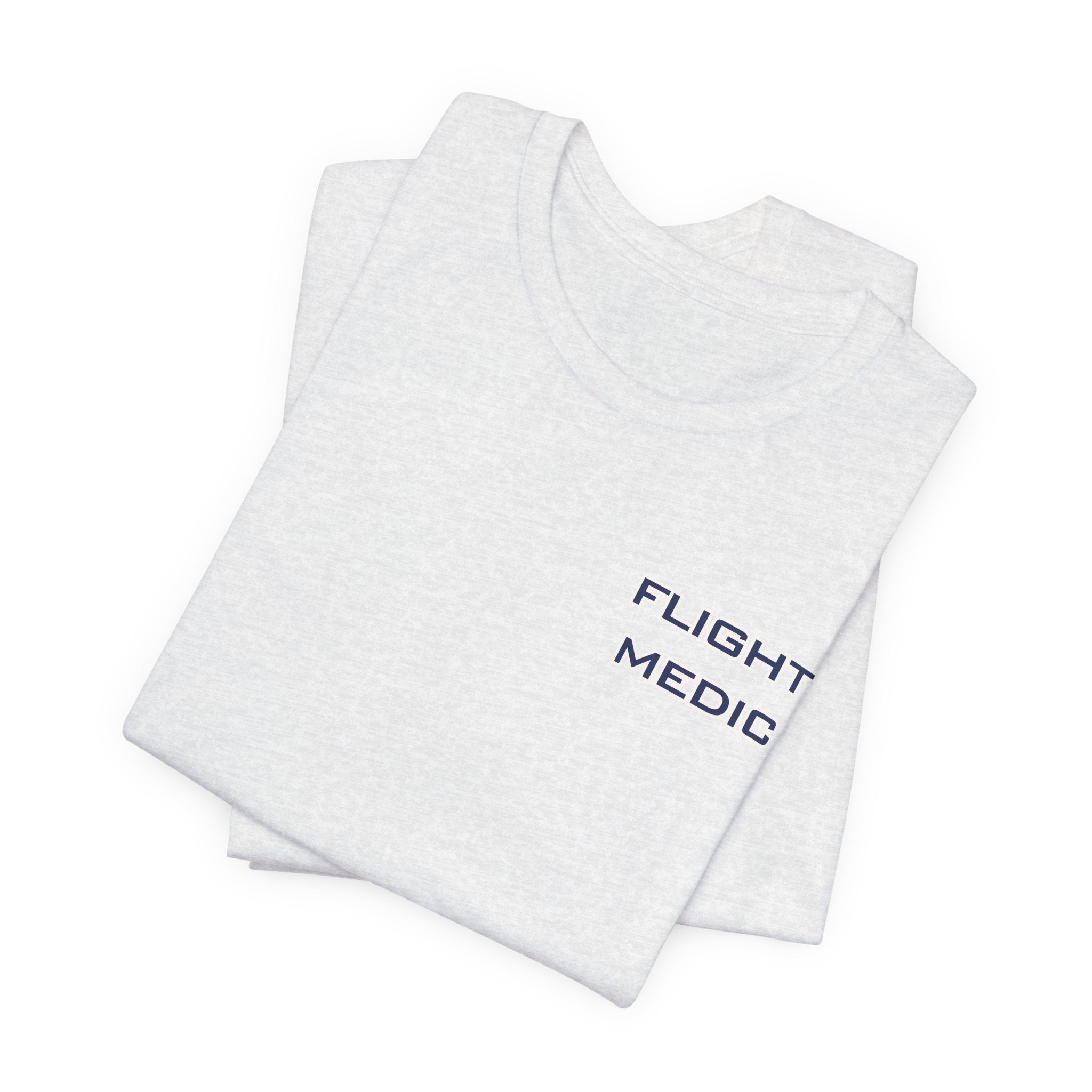 Folded white t-shirt with text 'Flight Medic' on the left chest by Rotor Wash & Wear