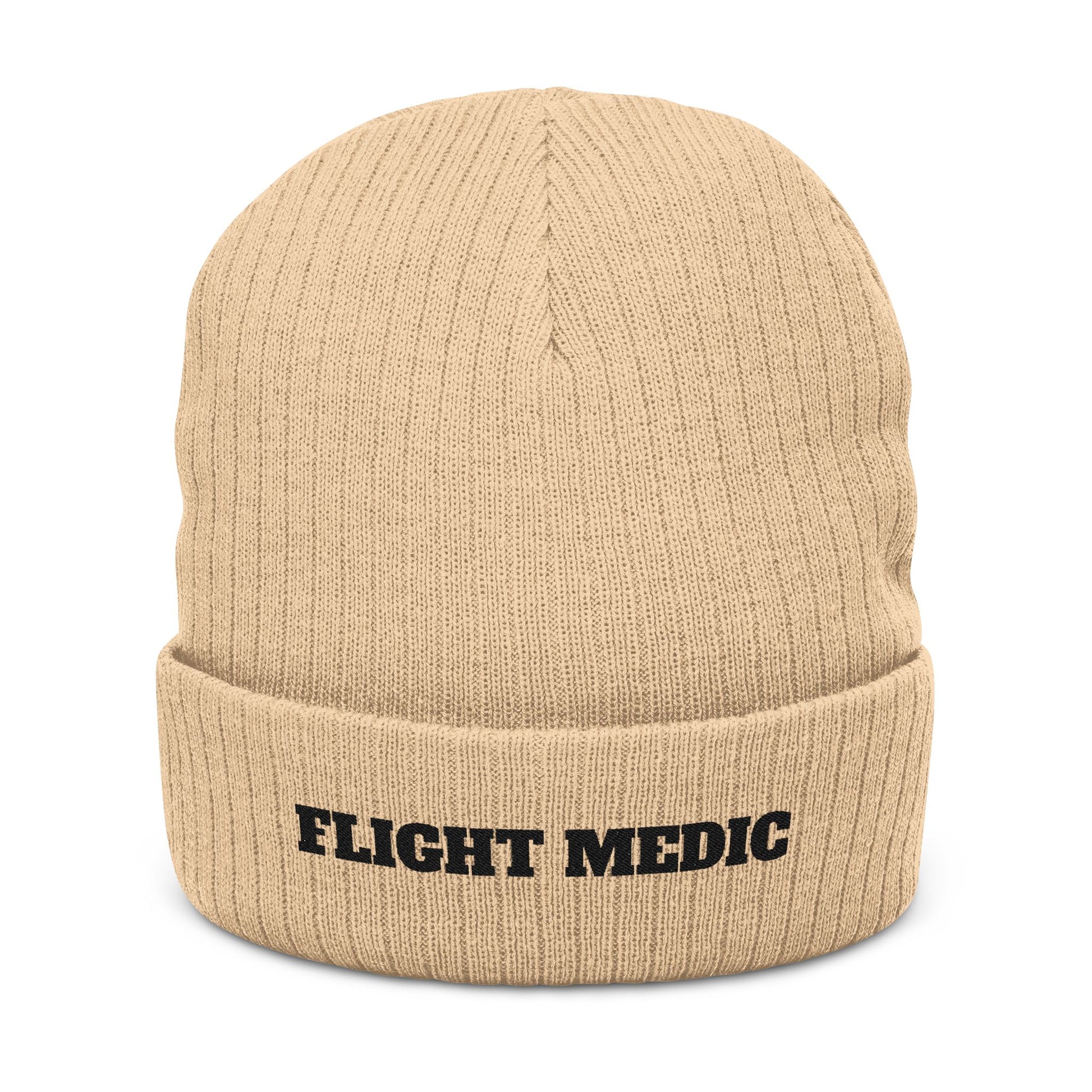 Beige beanie with 'FLIGHT MEDIC' text on a white background