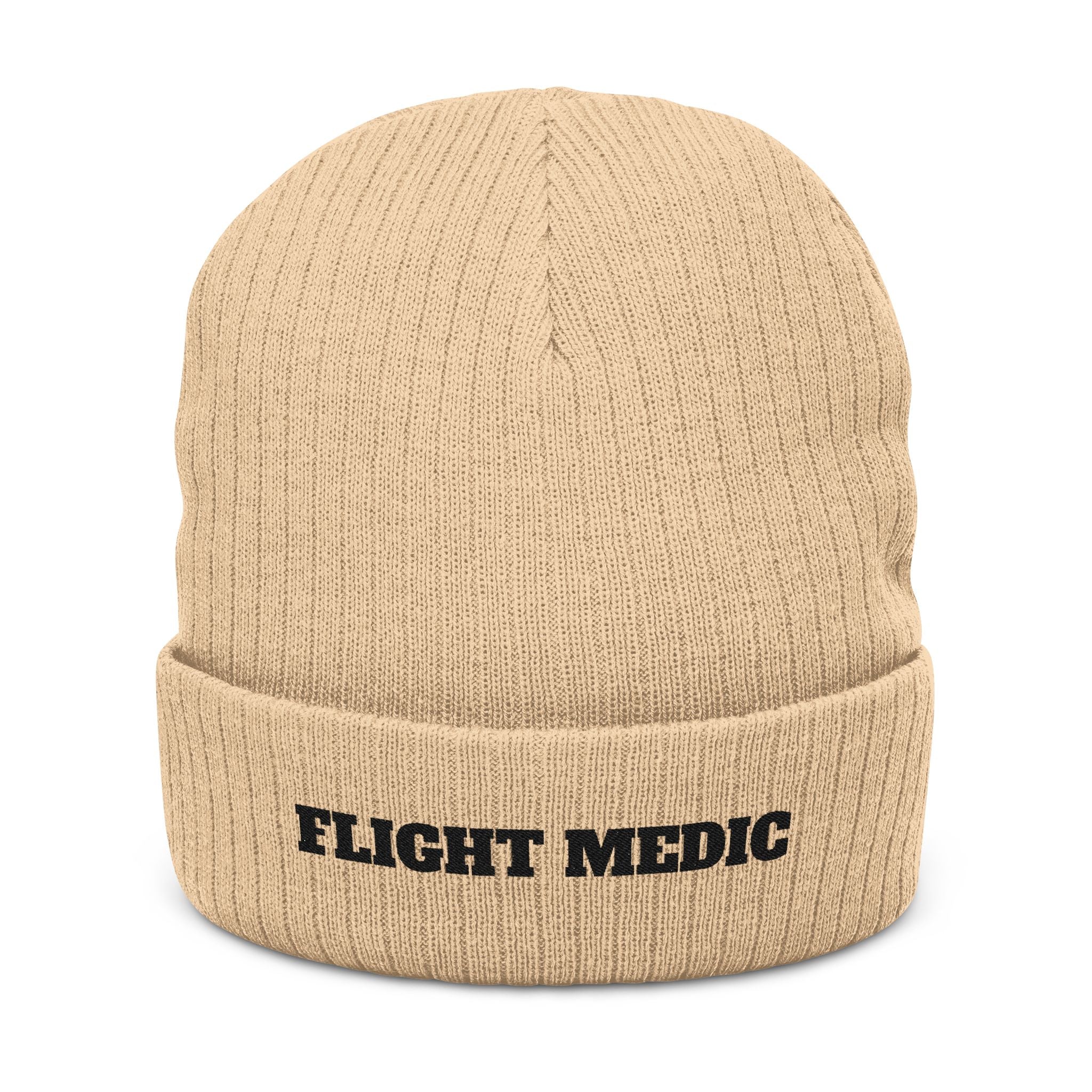 Beige beanie with 'FLIGHT MEDIC' text on a white background