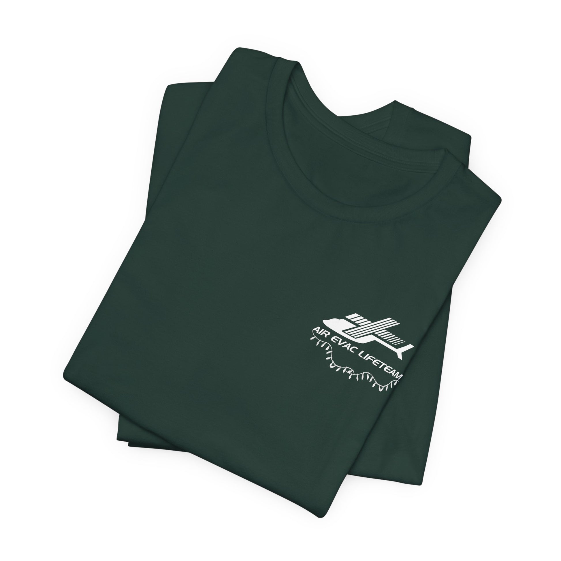 Folded dark green t-shirt with a white Air Evac logo and Christmas lights on a white background