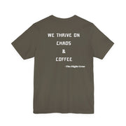 Gray t-shirt with white text "We thrive on chaos & coffee, the flight crew" on a white background