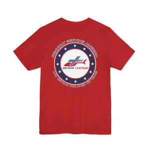 Red t-shirt with a patriotic Air Evac Lifeteam logo and text 'Proudly serving America and beyond for over 40 years' by Rotor Wash & Wear