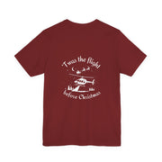 Maroon t-shirt with white helicopter graphic in a winter scene with Santa and his sleigh in the background with text "'Twas the flight before Christmas" by Rotor Wash & Wear
