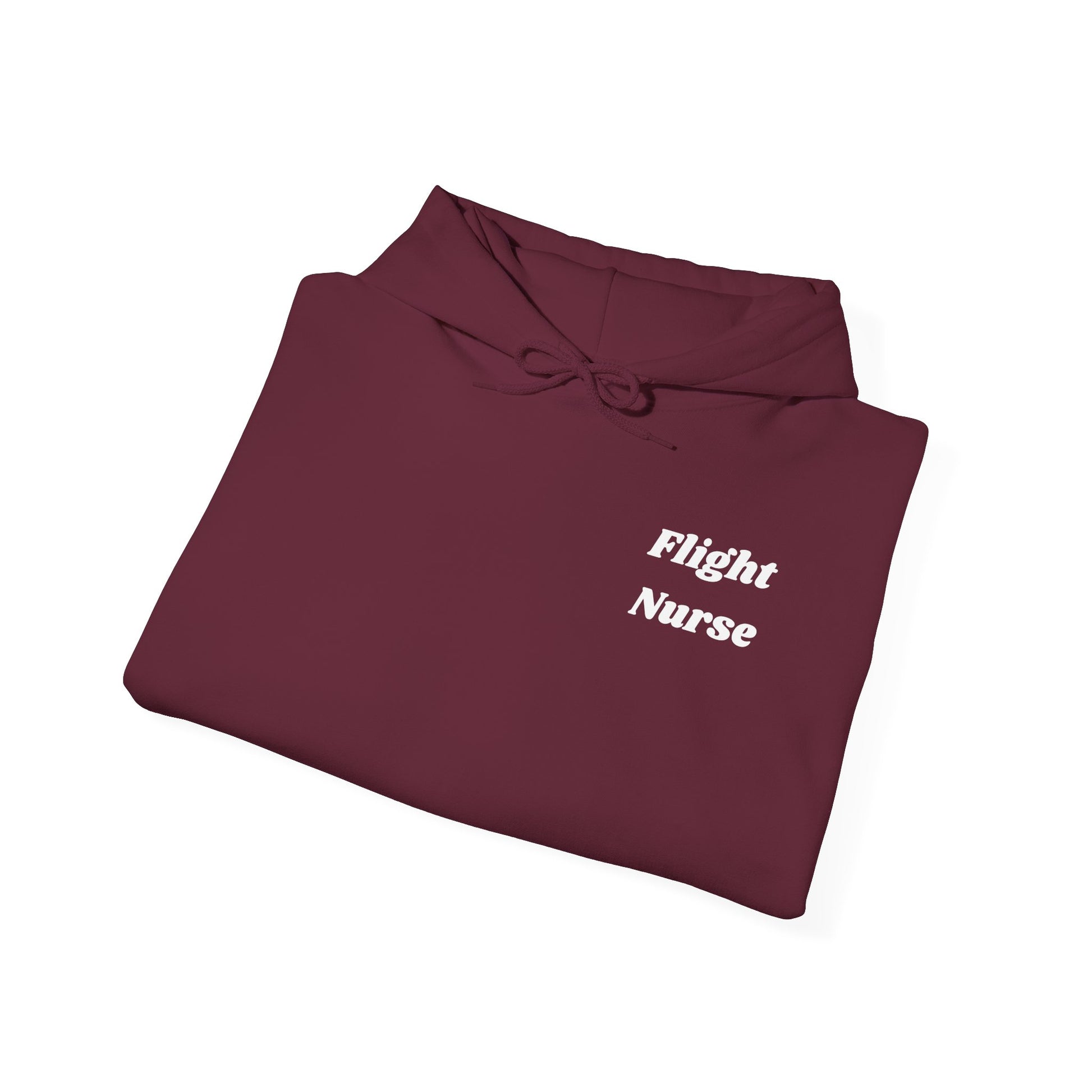 Folded maroon hoodie with white text "flight nurse" on a white background