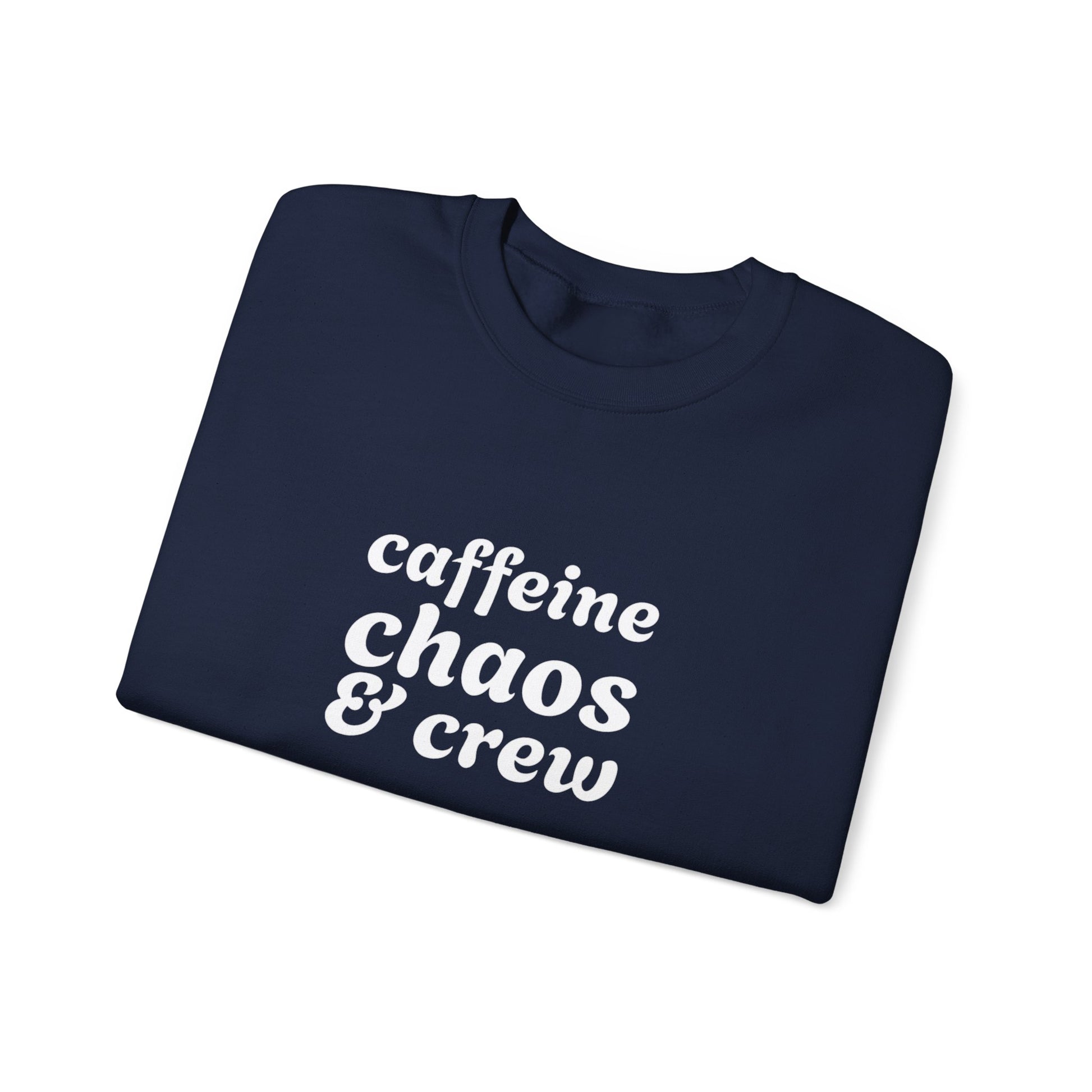Folded navy sweatshirt with 'caffeine chaos & crew' text on by Rotor Wash & Wear