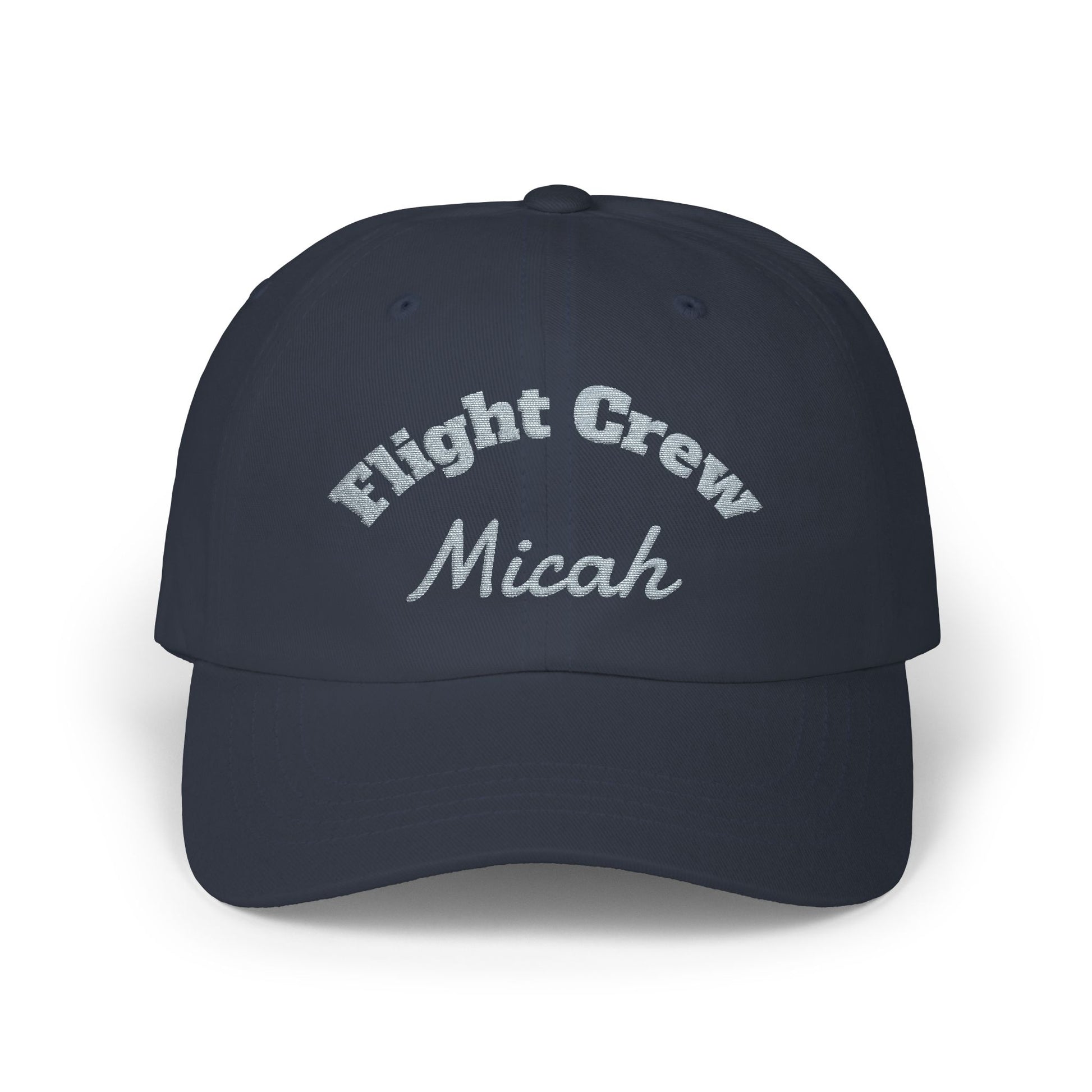 Navy blue cap with 'Flight Crew Micah' text on a white background