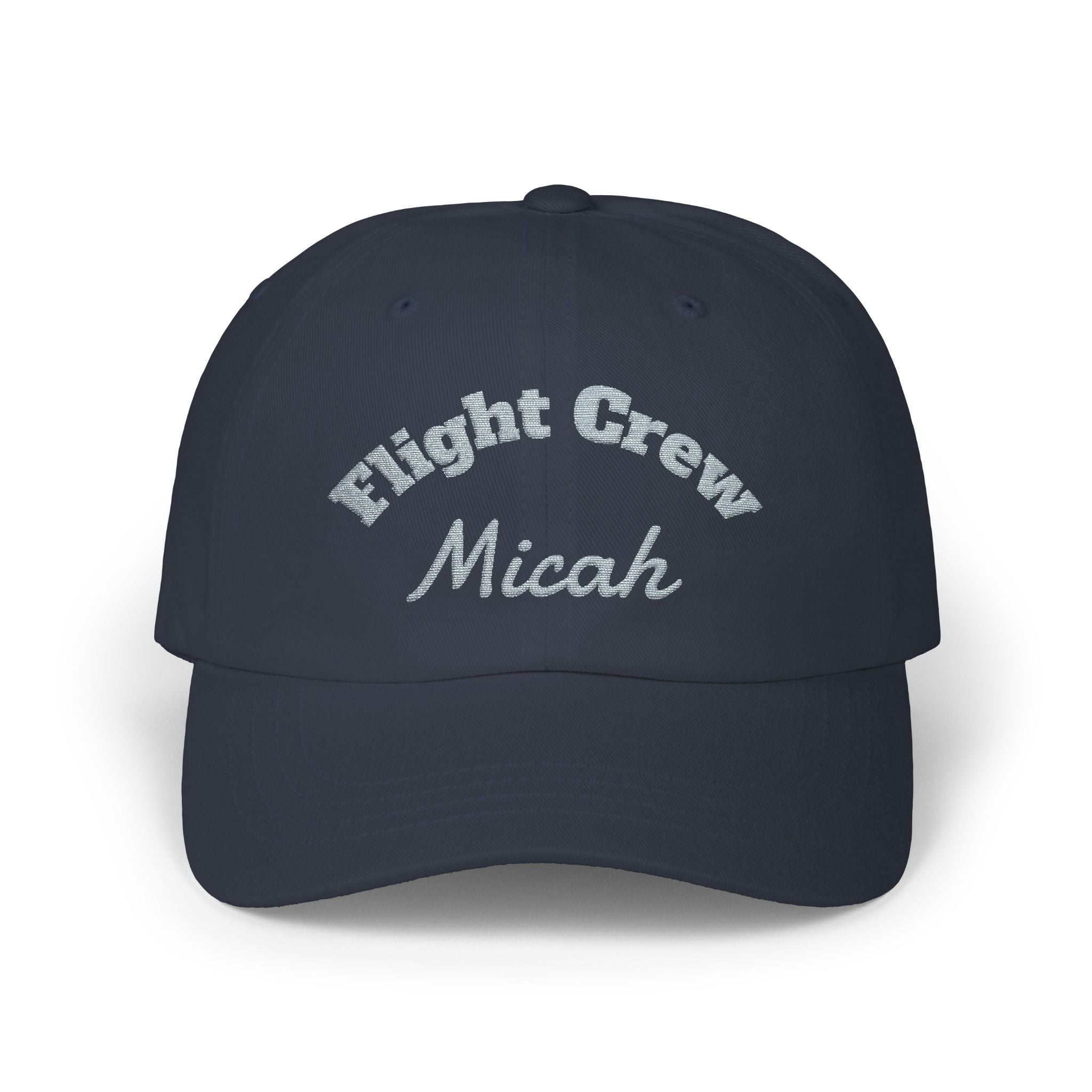 Navy blue cap with 'Flight Crew Micah' text on a white background