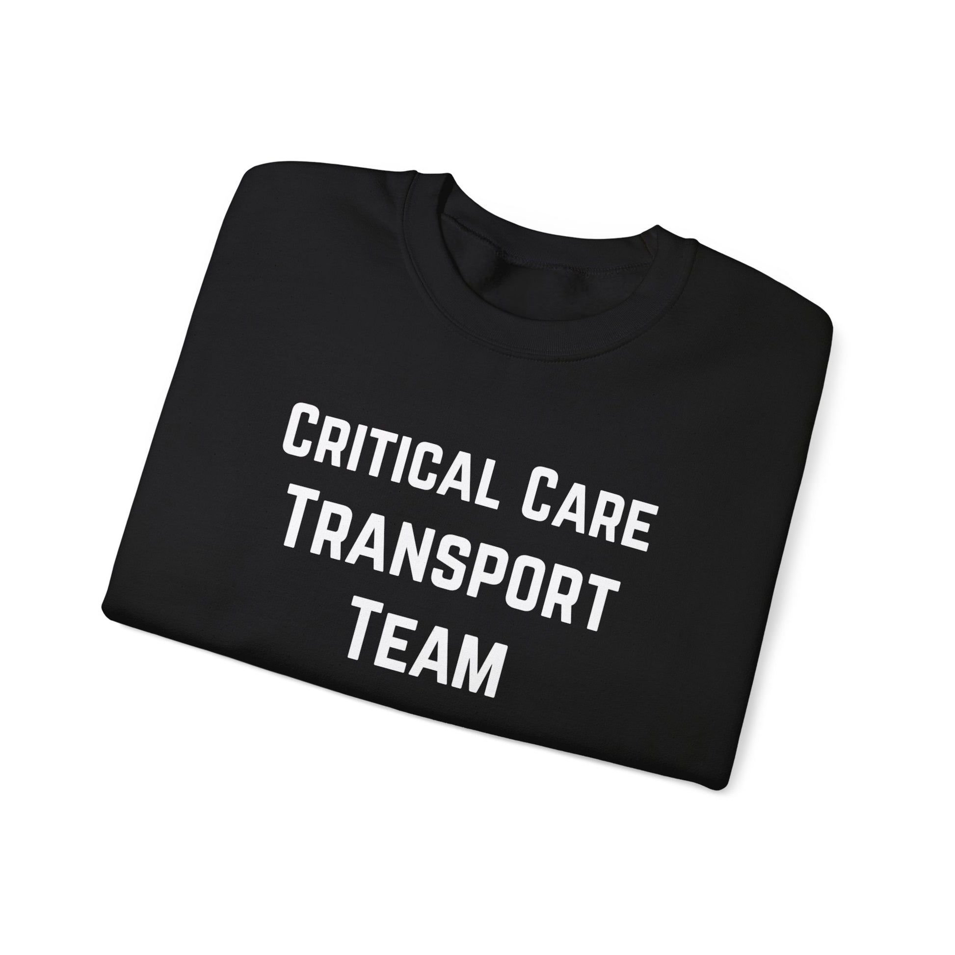 Folded black sweatshirt with 'Critical Care Transport Team' text by Rotor Wash & Wear