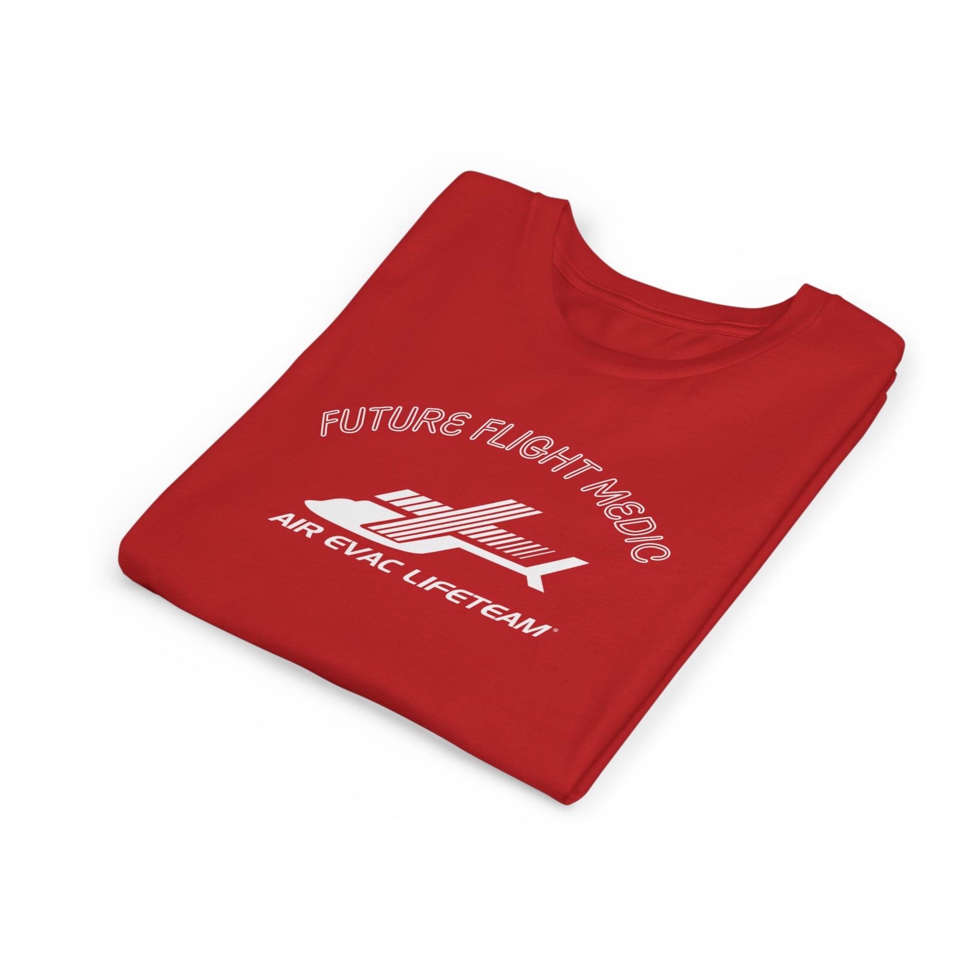 Folded red kid's t-shirt with Air Evac Lifeteam logo and text "Future Flight Medic" by Rotor Wash & Wear