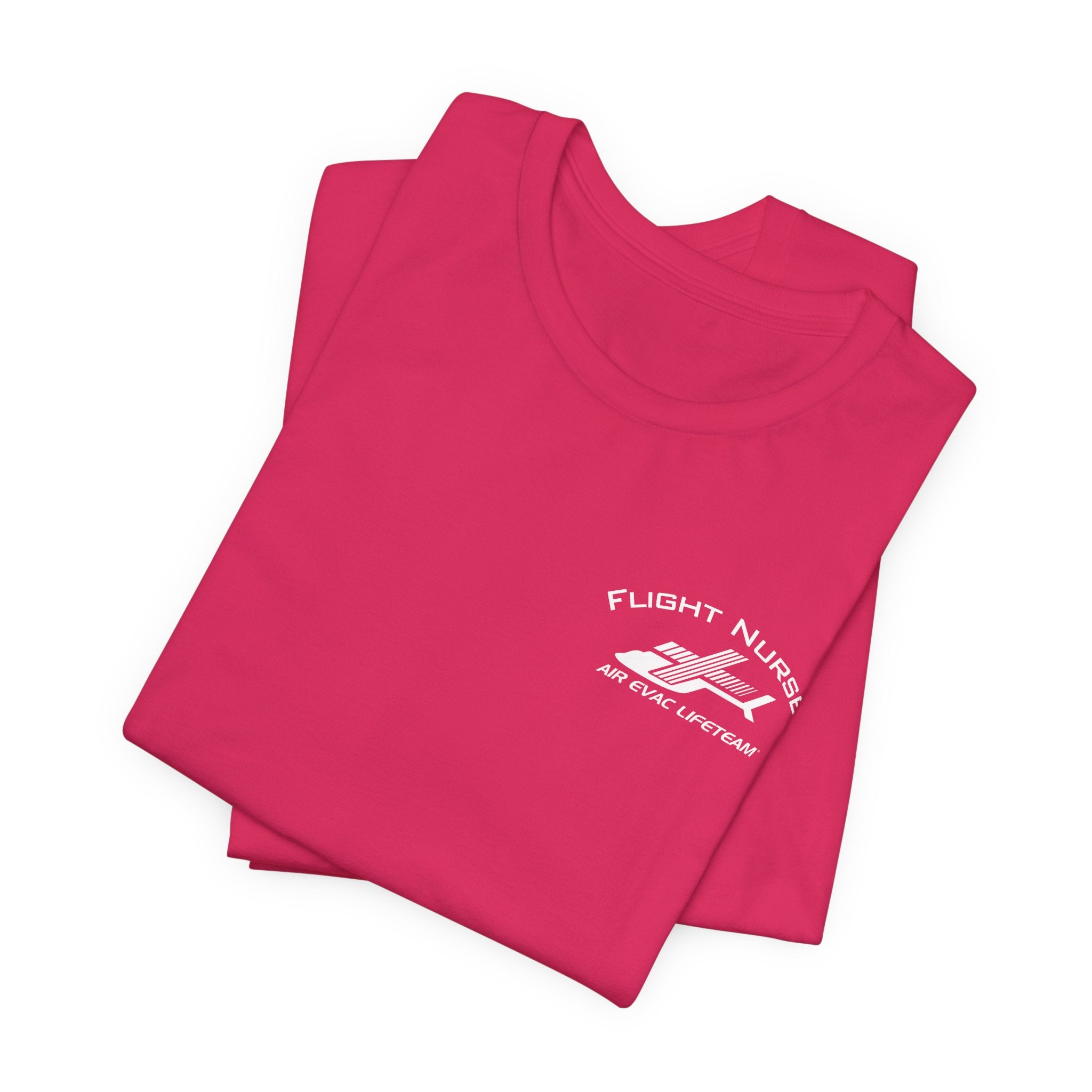 Folded pink t-shirt with small 'Flight Nurse" text and Air Evac Lifeteam' logo on the left chest by Rotor Wash & Wear