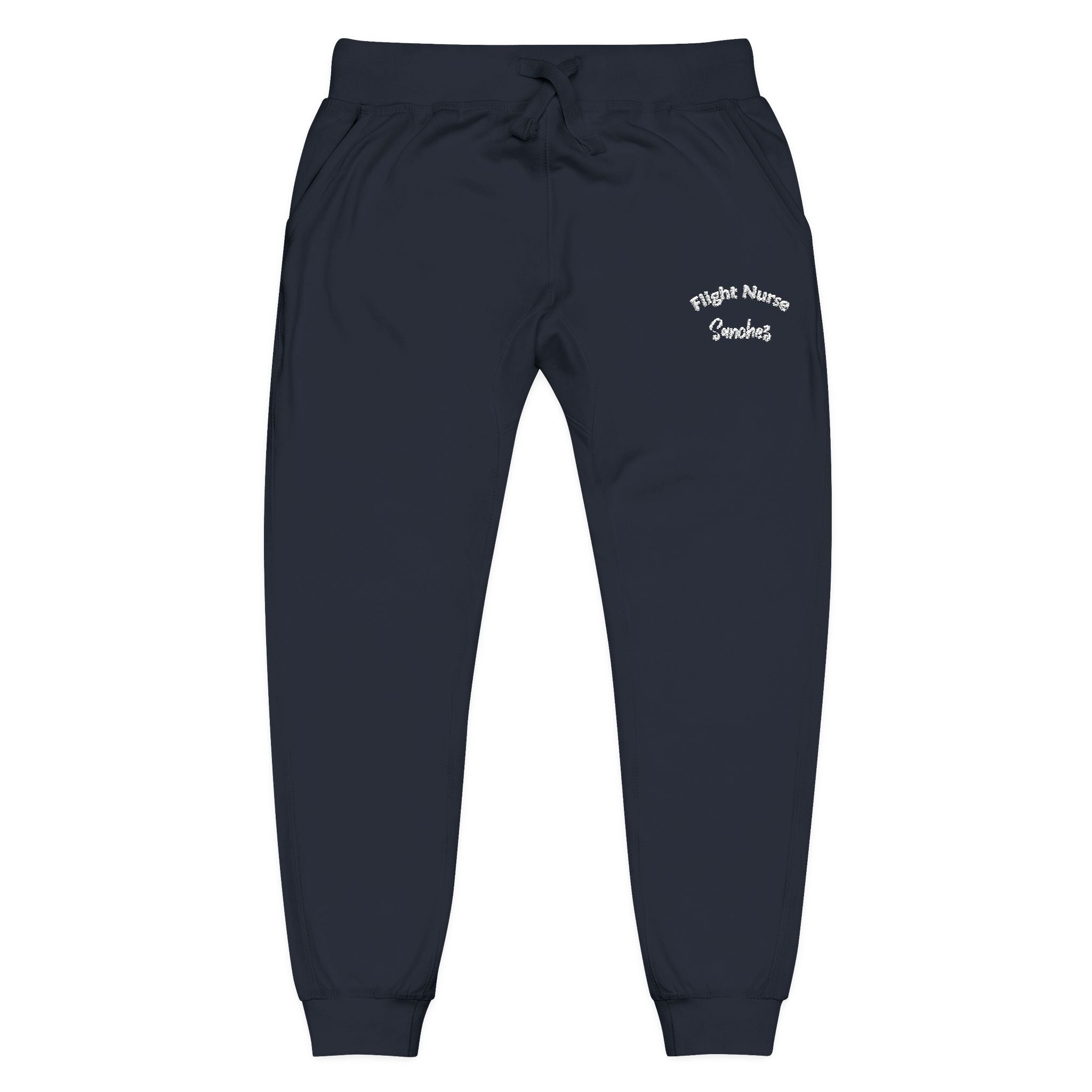 Navy joggers with embroidered &#39;Flight Nurse Sanchez&#39; text on the thigh against a white background