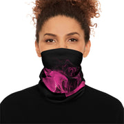 Person wearing a black neck gaiter with pink smoke pattern by Rotor Wash & Wear