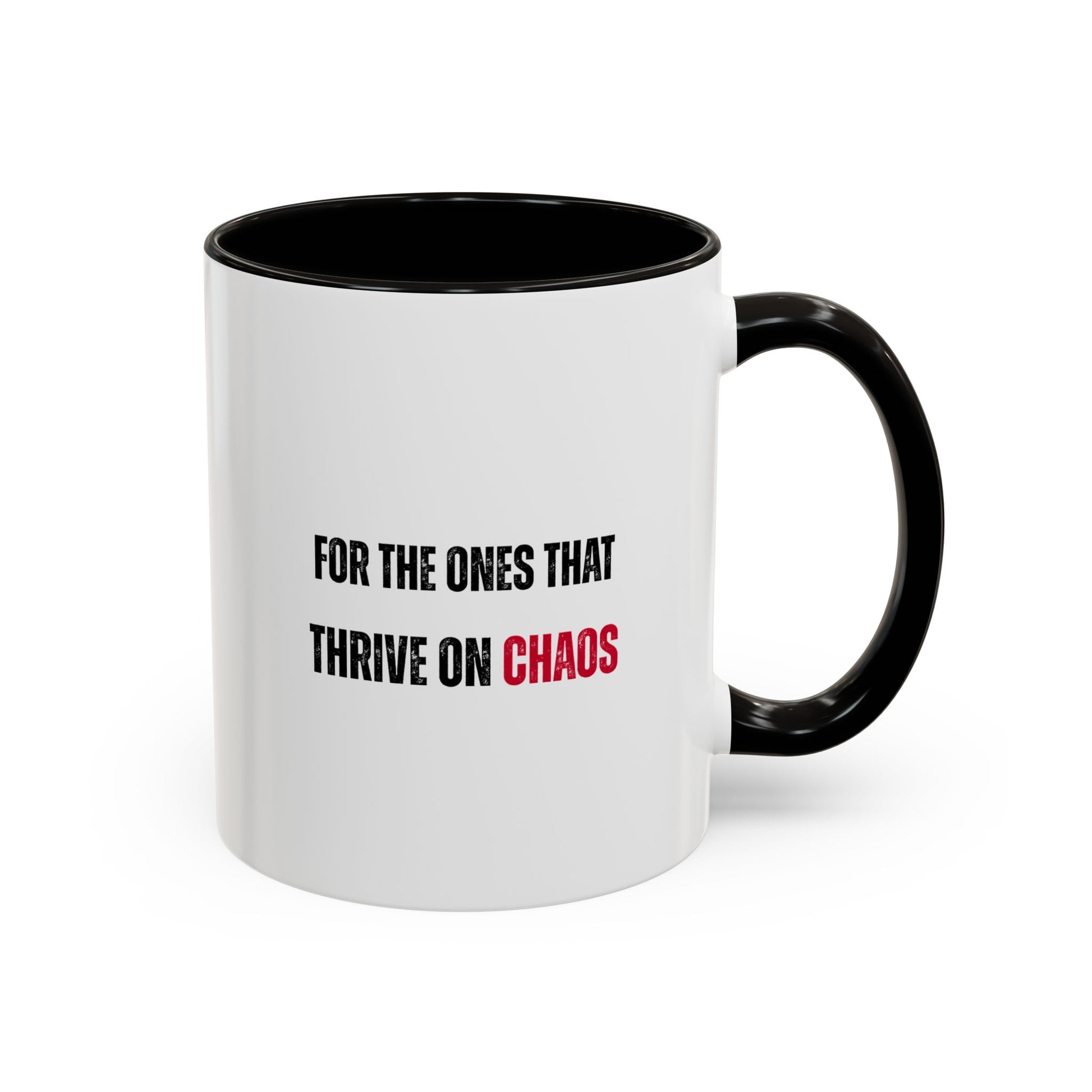 White mug with black interior and handle, featuring text 'FOR THE ONES THAT THRIVE ON CHAOS' on a white background.