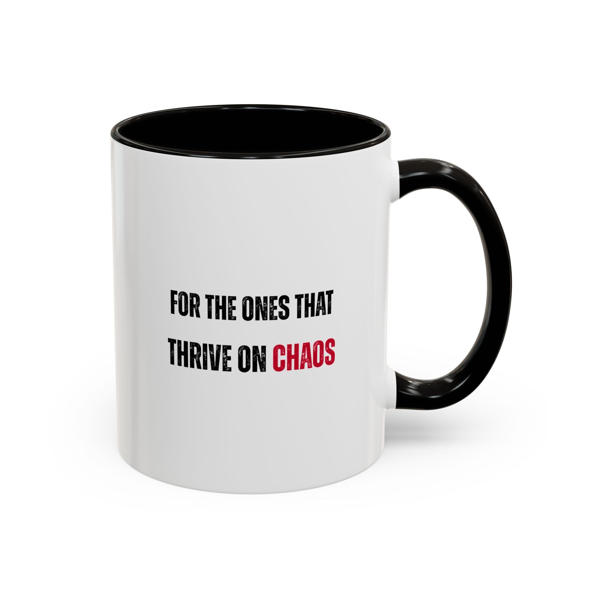 White mug with black interior and handle, featuring text 'FOR THE ONES THAT THRIVE ON CHAOS' on a white background.