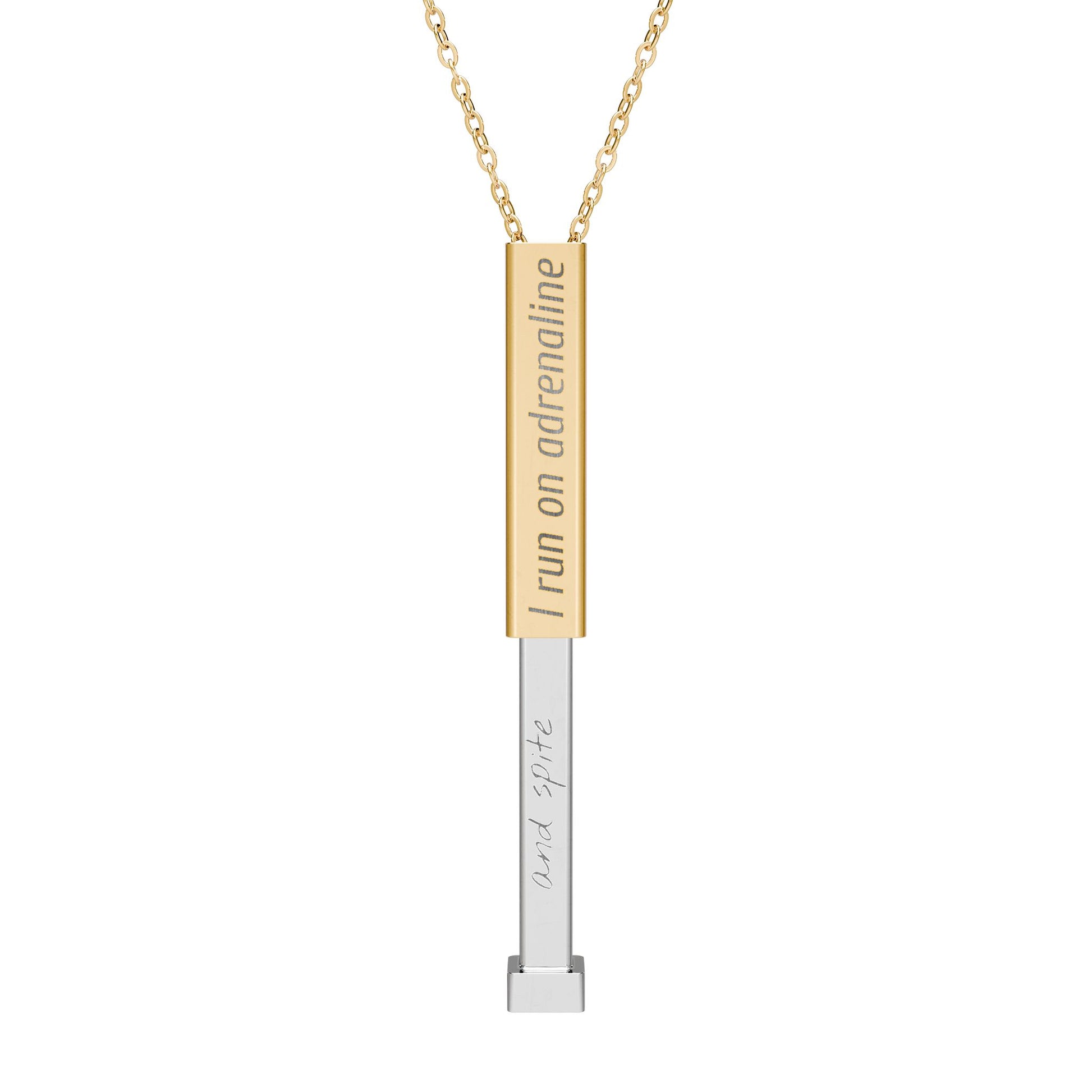 Silver and gold two-toned necklace with a cylindrical pendant engraved with 'I run on adrenaline' with hidden interior engraving "and spite" by Rotor Wash & Wear