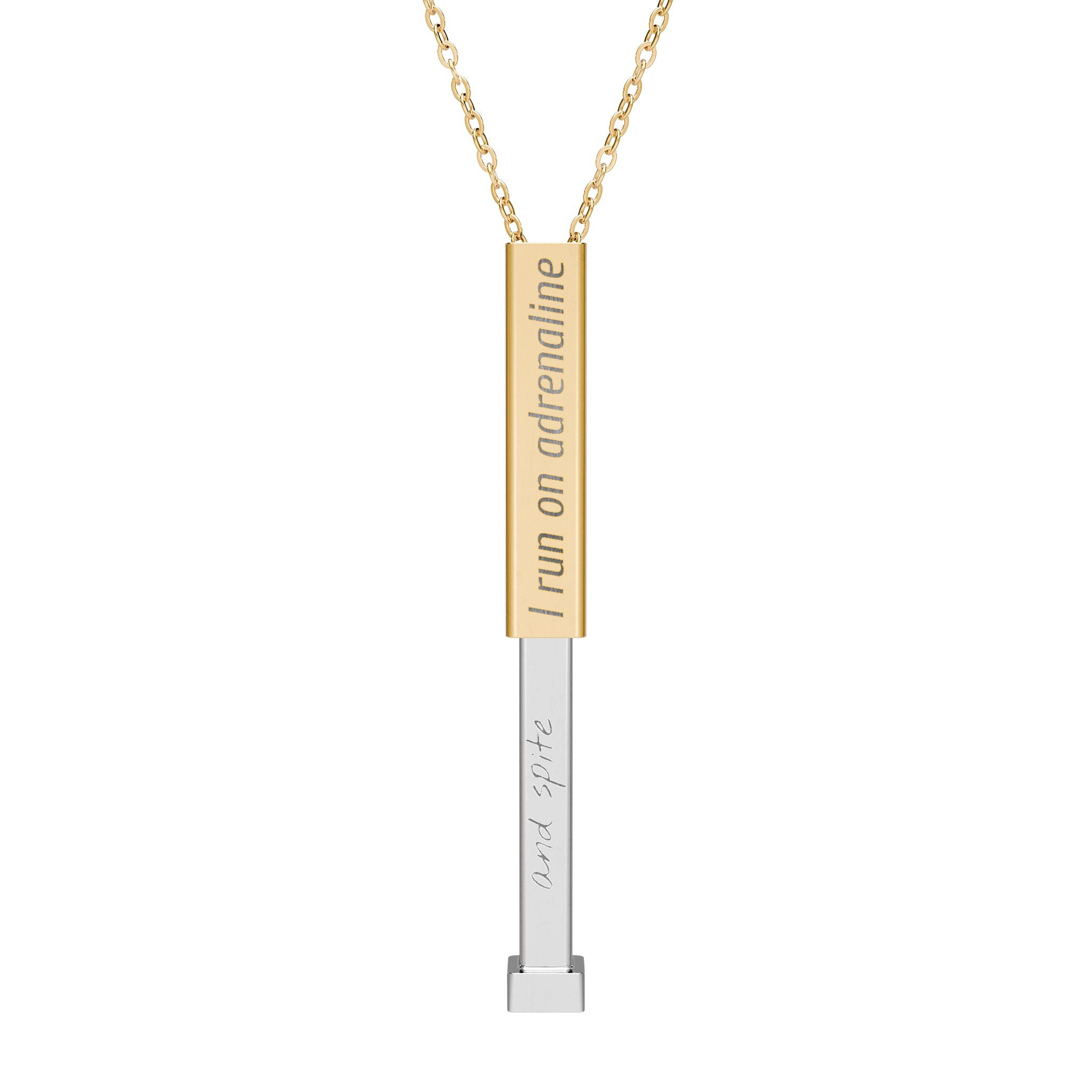 Silver and gold two-toned necklace with a cylindrical pendant engraved with 'I run on adrenaline' with hidden interior engraving "and spite" by Rotor Wash & Wear