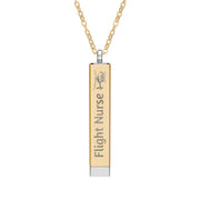 Silver and gold two-toned necklace with a cylindrical pendant engraved with 'flight nurse' with hidden interior engraving "Fly Safe. Come home." by Rotor Wash & Wear