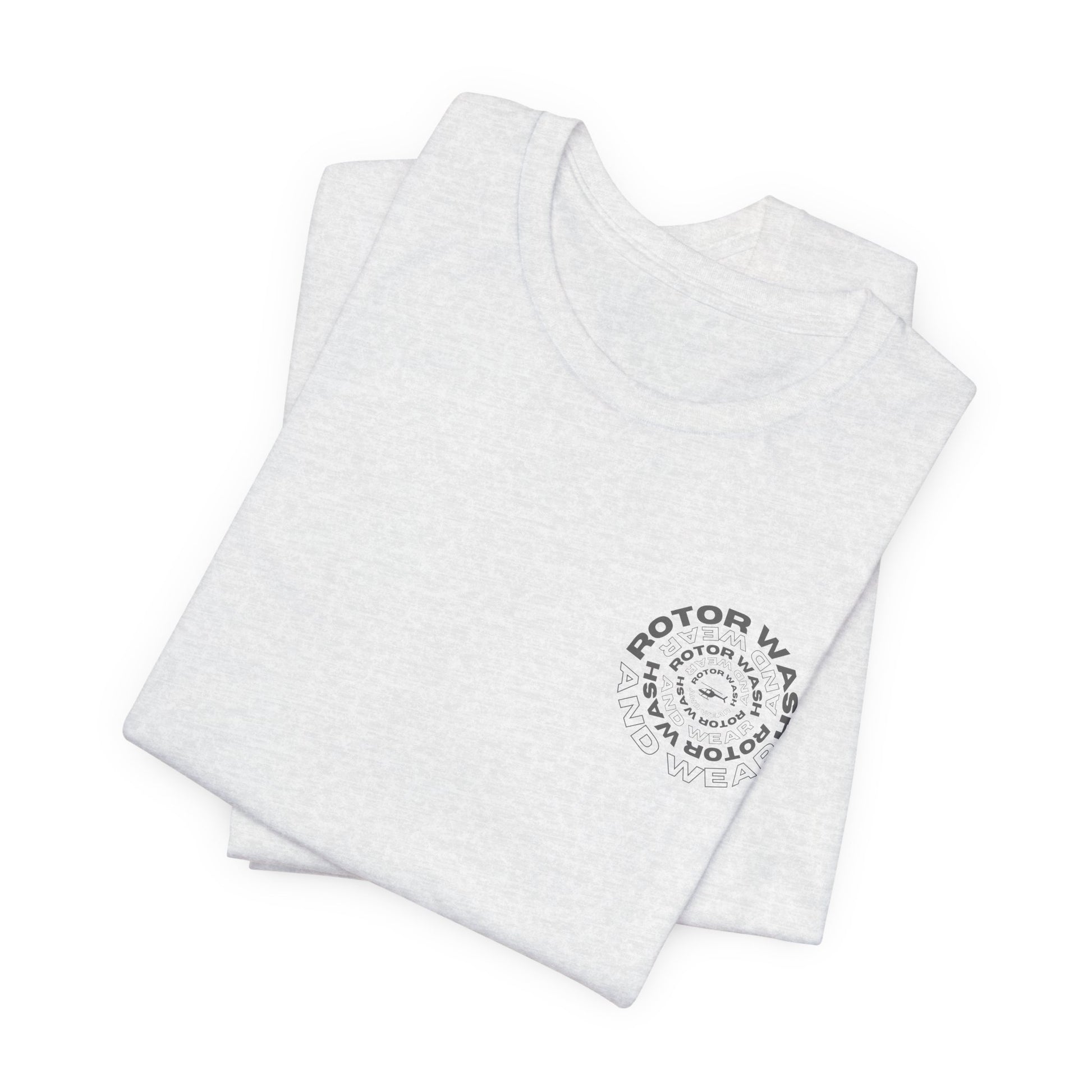 Folded white t-shirt with 'Rotor Wash and Wear' circular design text design on the left chest on a white background