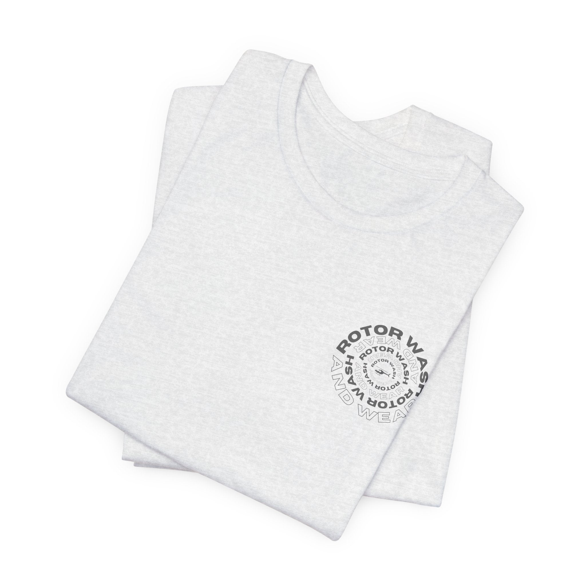 Folded white t-shirt with 'Rotor Wash and Wear' circular design text design on the left chest on a white background