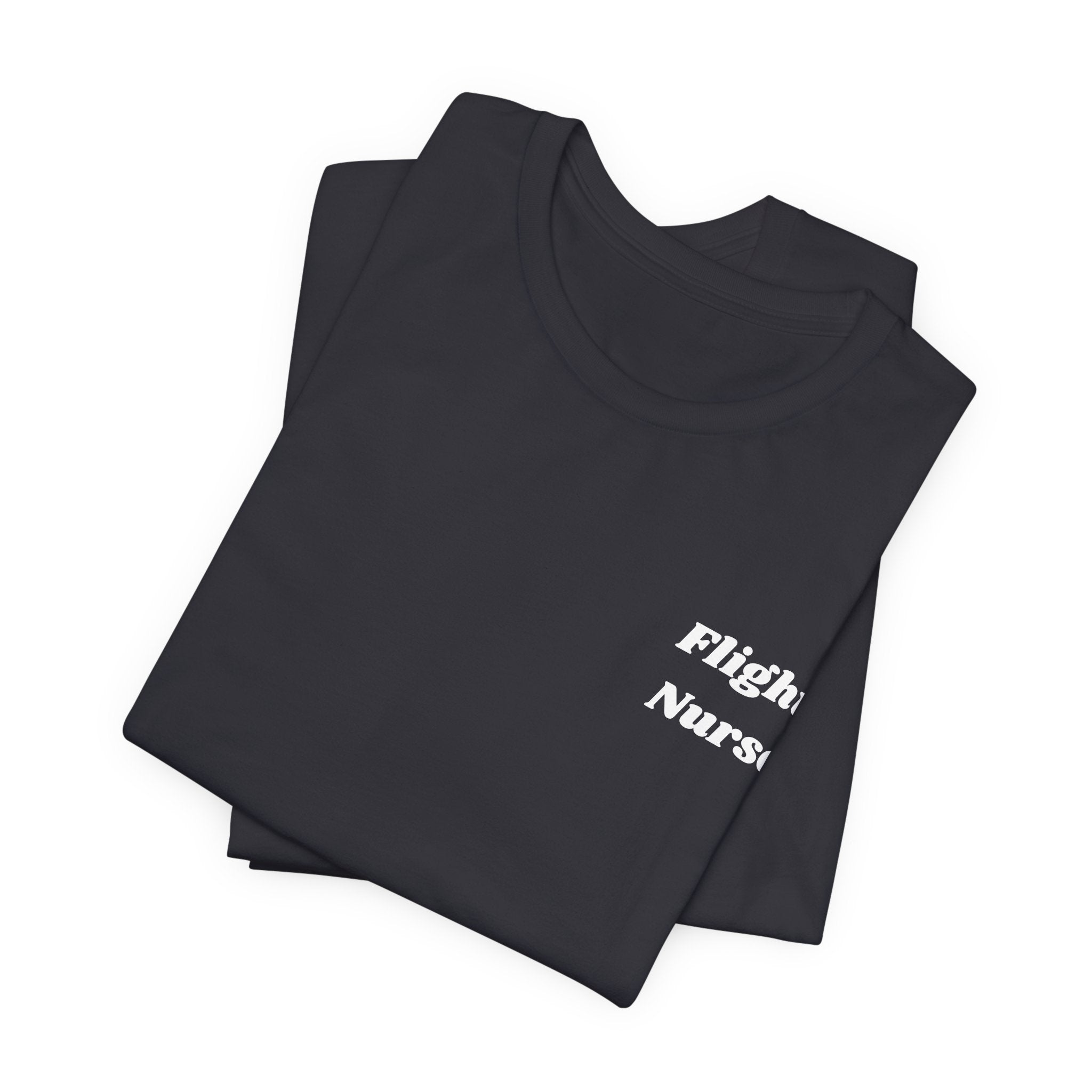 Folded dark gray t-shirt with 'Flight Nurse' text on a white background