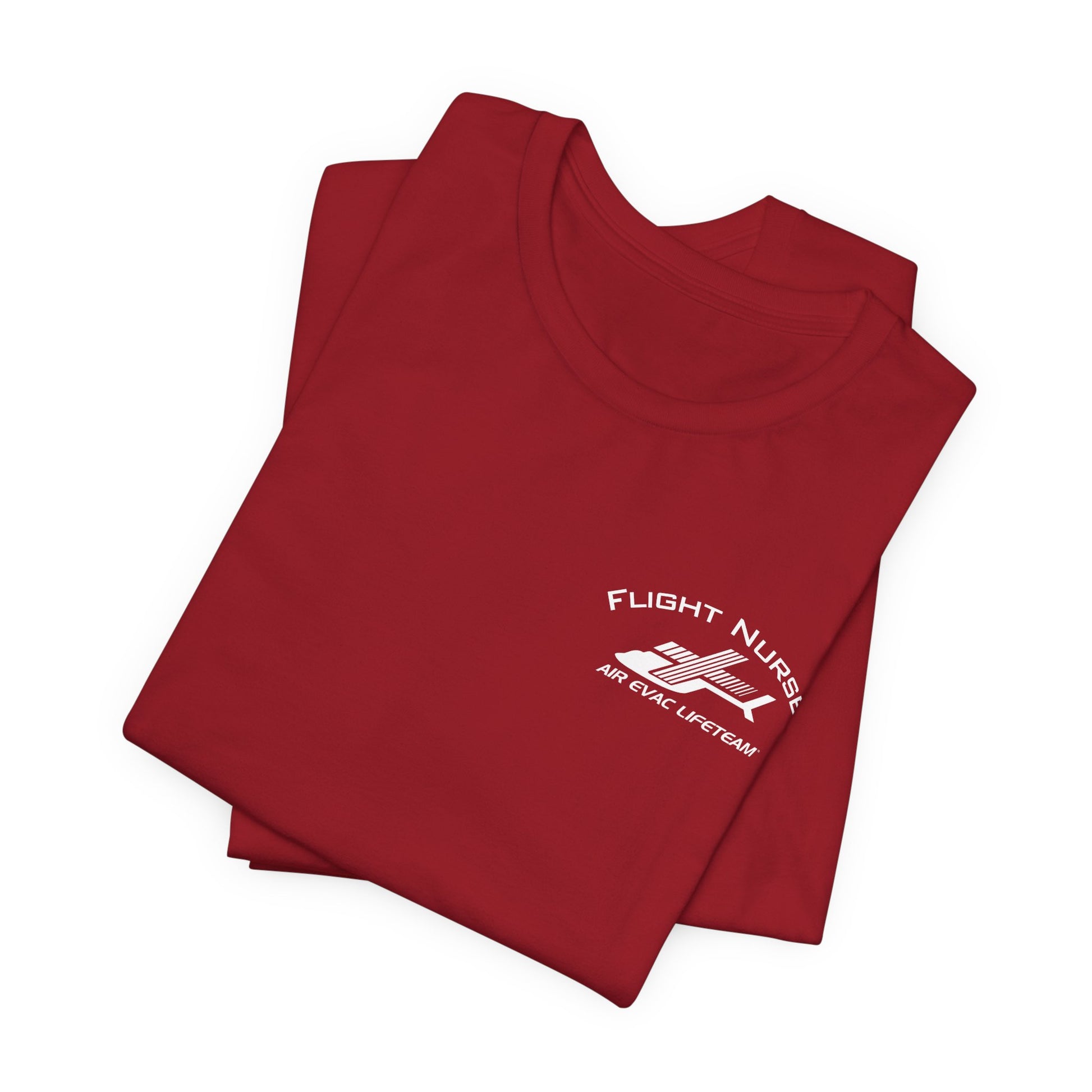 Folded red t-shirt with small 'Flight Nurse" text and Air Evac Lifeteam' logo on the left chest by Rotor Wash & Wear