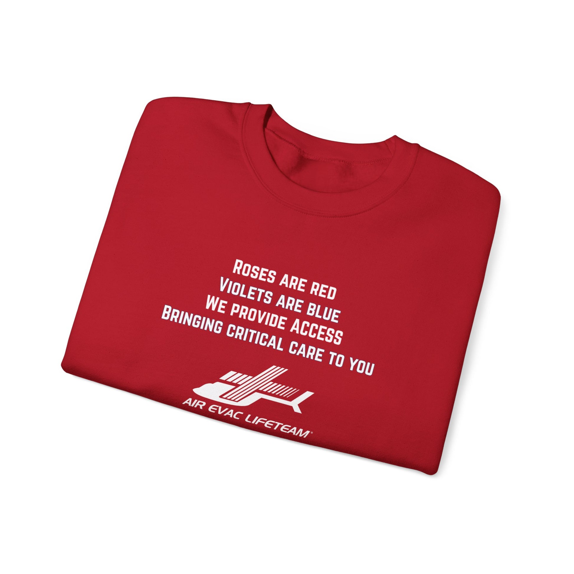 Folded red crewneck sweatshirt with Valentine's day poem and Air Evac Lifeteam logo on a white background