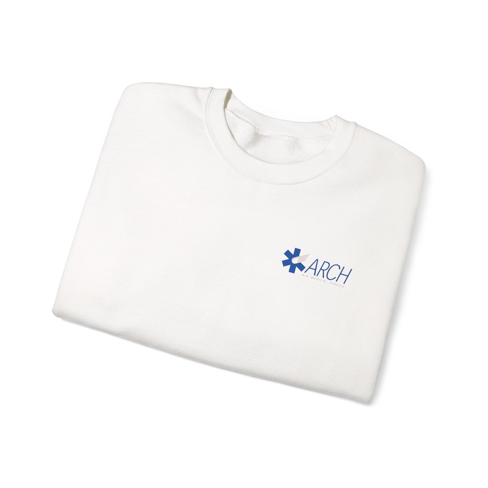 Folded white crewneck sweatshirt with a small ARCH by Air Methods logo on the left chest by Rotor Wash & Wear