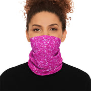 Person wearing a pink and white patterned neck gaiter by Rotor Wash & Wear