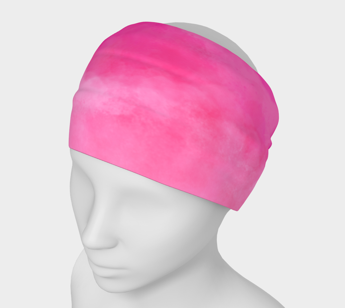 Headband with various shades of pink on a mannequin head against a white background.