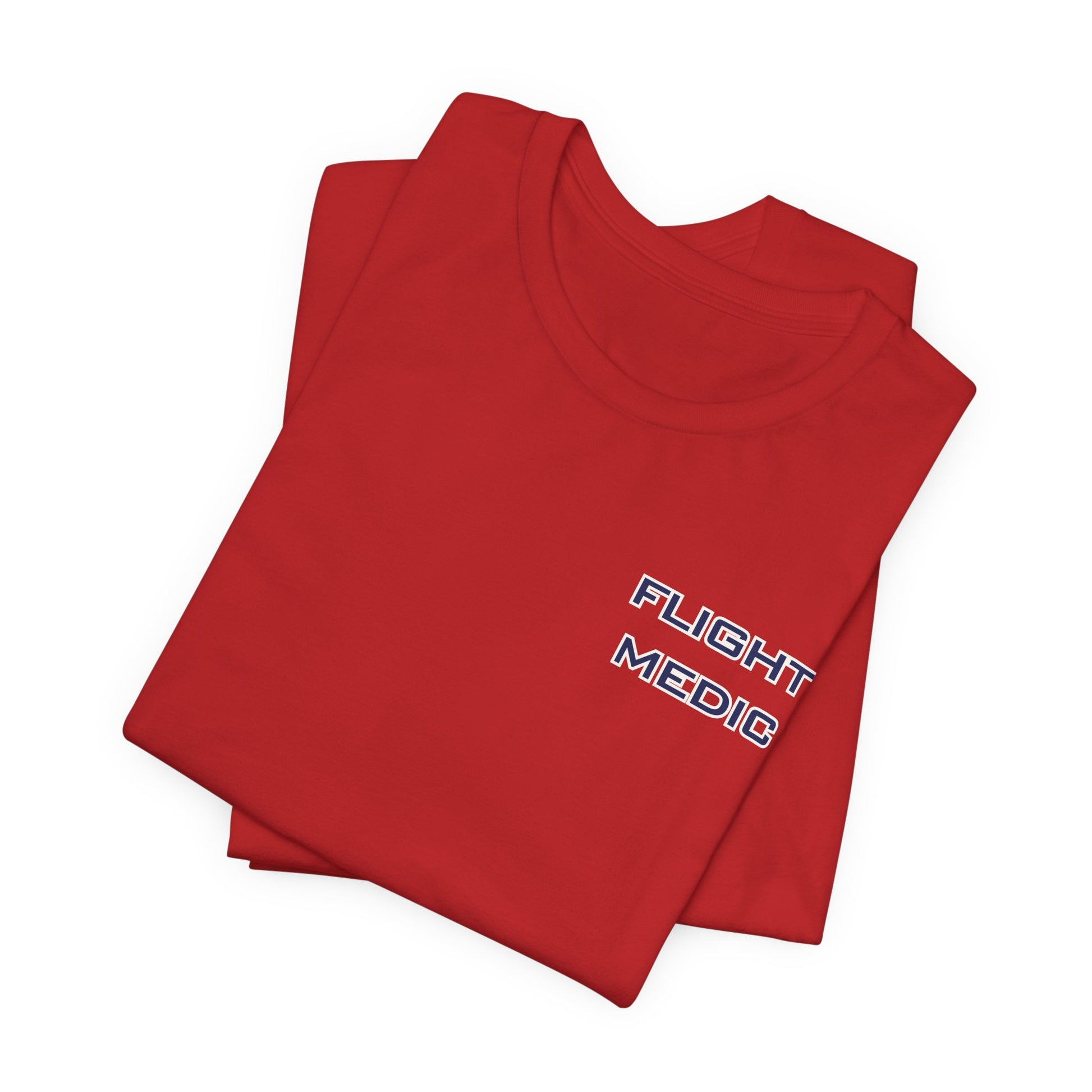 Folded red t-shirt with text 'Flight Medic' on the left chest by Rotor Wash & Wear