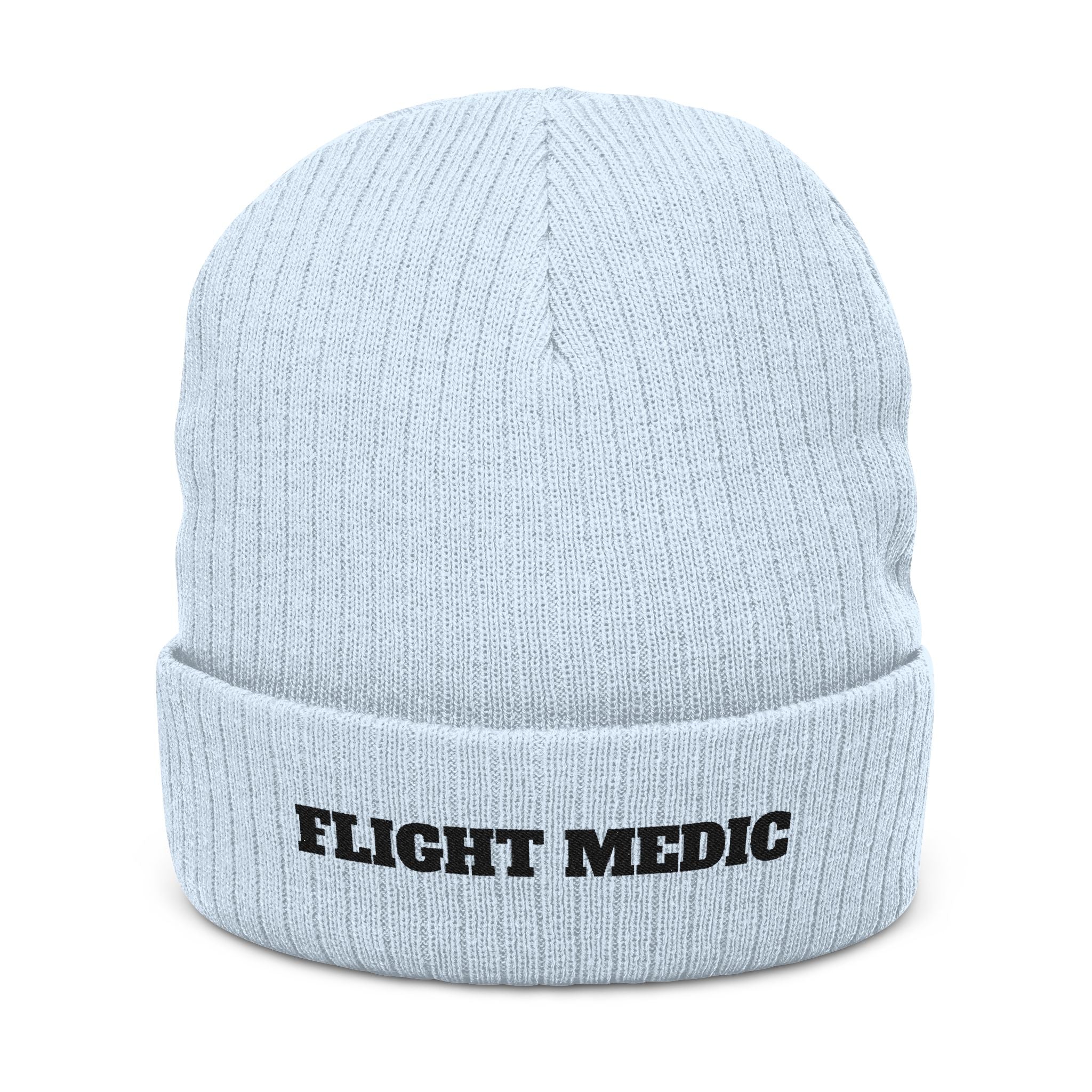 Light blue beanie with 'FLIGHT MEDIC' text on a white background