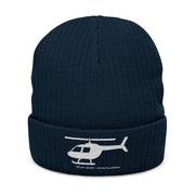 Navy blue beanie with helicopter design and text on a white background