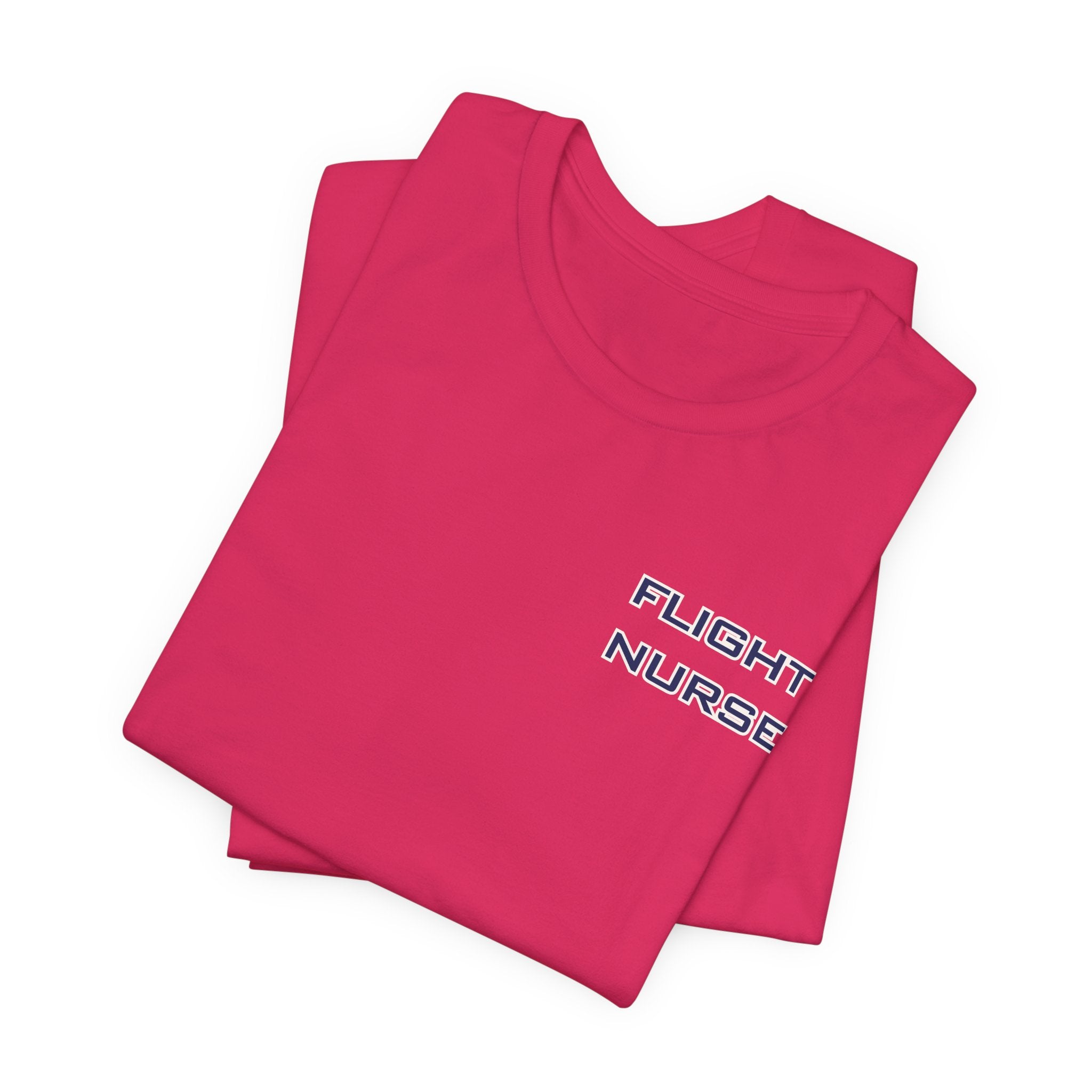 Folded pink t-shirt with text 'Flight Nurse' on the left chest by Rotor Wash & Wear