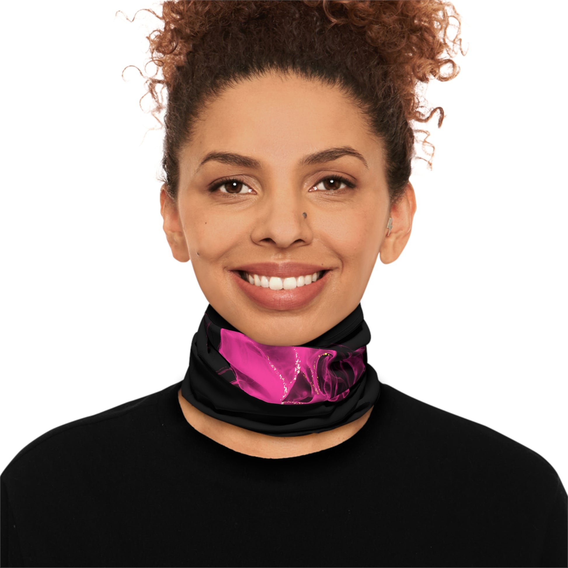 Person wearing black neck gaiter with pink smoke pattern by Rotor Wash & Wear
