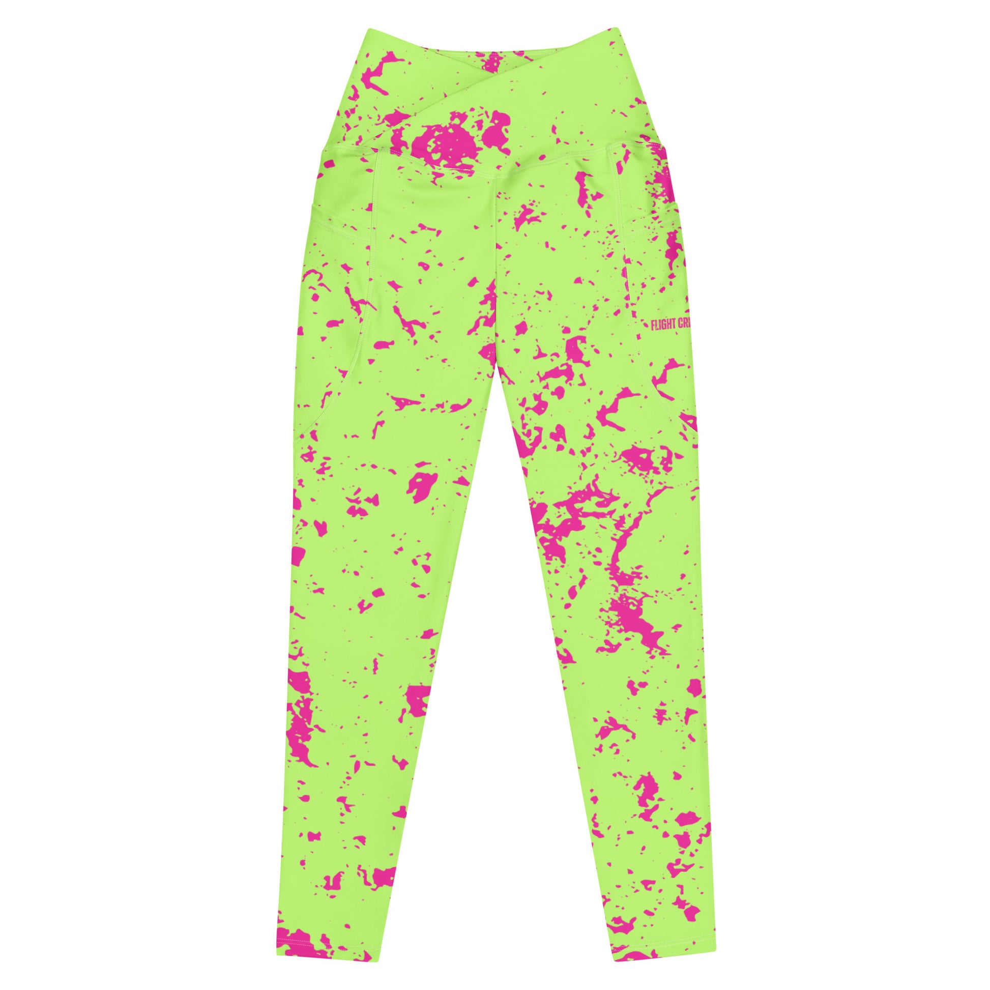 Neon green leggings with pink splatter pattern on a white background