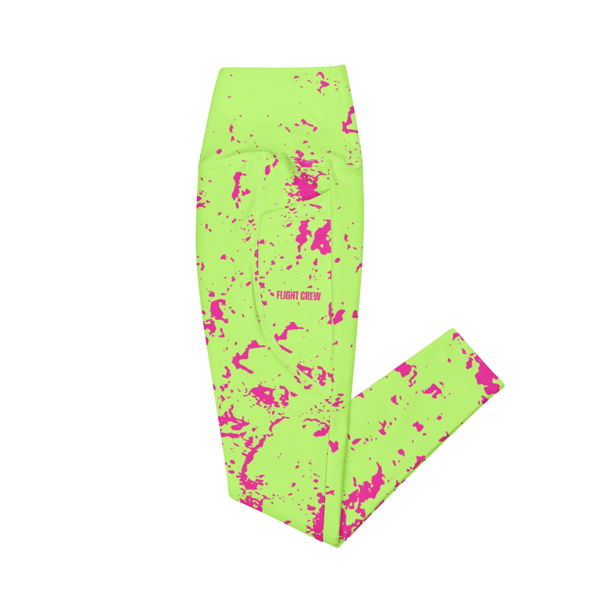Neon green leggings with pink splatter pattern on a white background