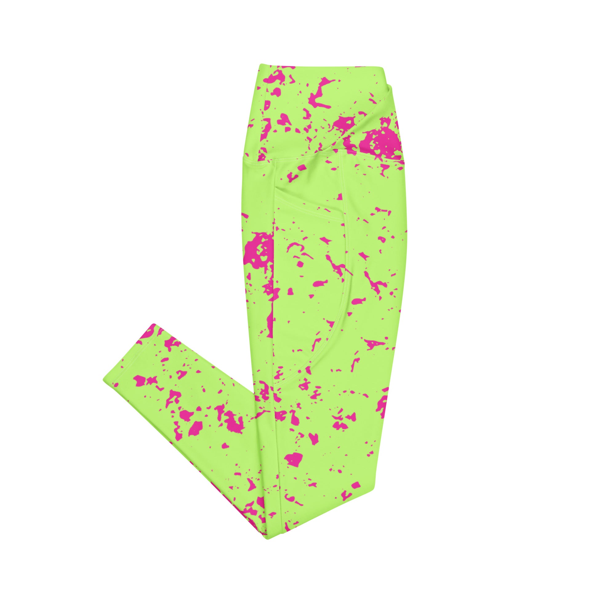 Neon green leggings with pink splatter pattern on a white background