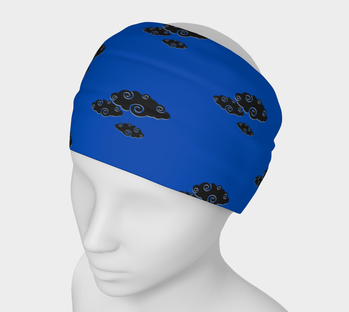 Royal blue headband with black cloud design on a mannequin head with a white background.