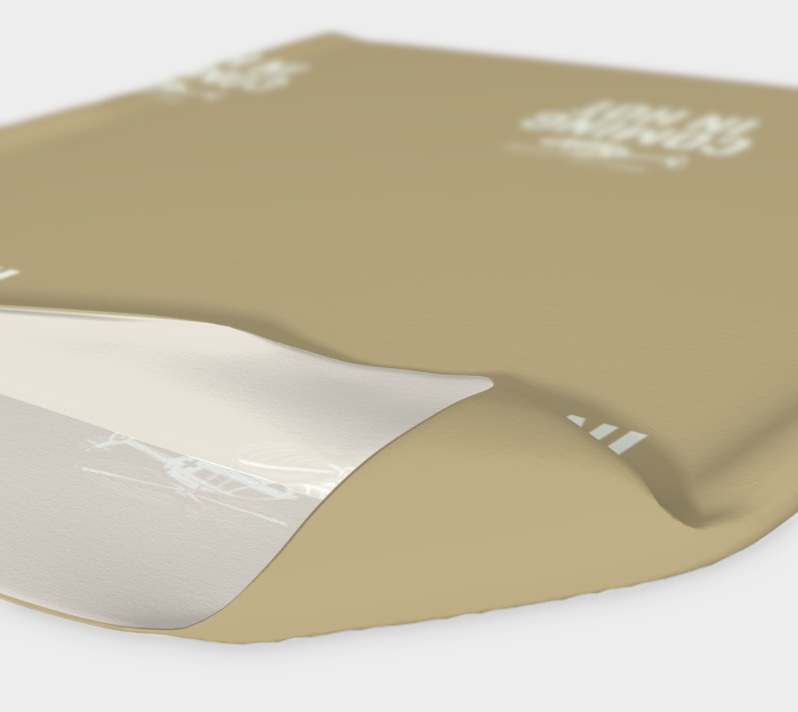 Beige headband with "coming in hot" text and helicopter graphics on a white background