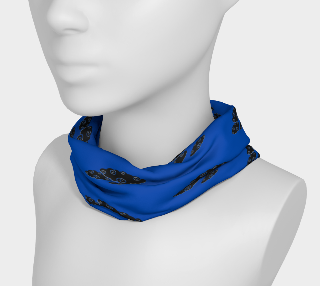 Mannequin wearing a blue neck gaiter with black cloud patterns on a white background