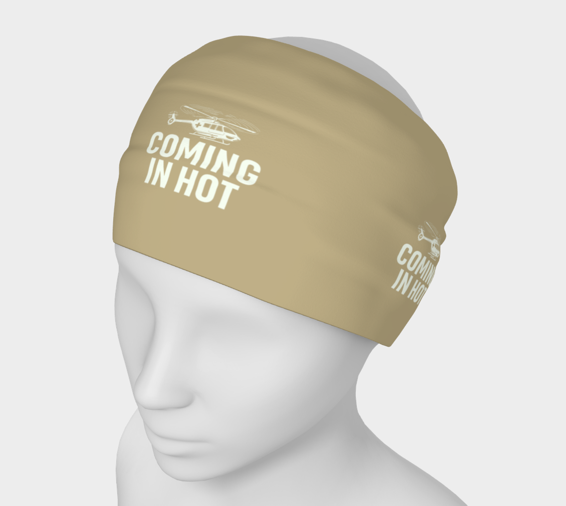 Beige headband with 'Coming In Hot' text and helicopter graphic on a mannequin head against a white background