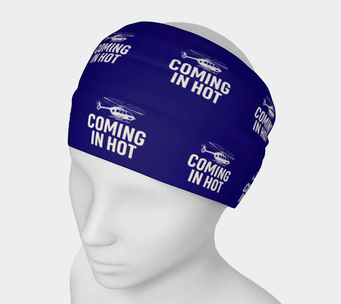 Blue headband with 'Coming in Hot' text and helicopter graphics on a white mannequin head.